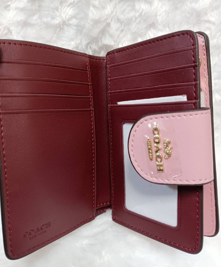 COACH　二つ折り財布　型押し　ピンク