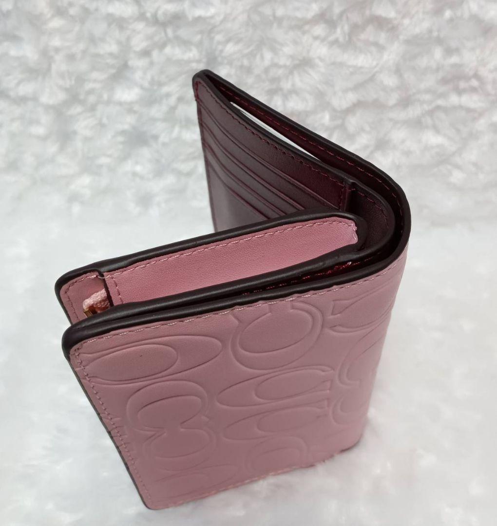 COACH　二つ折り財布　型押し　ピンク