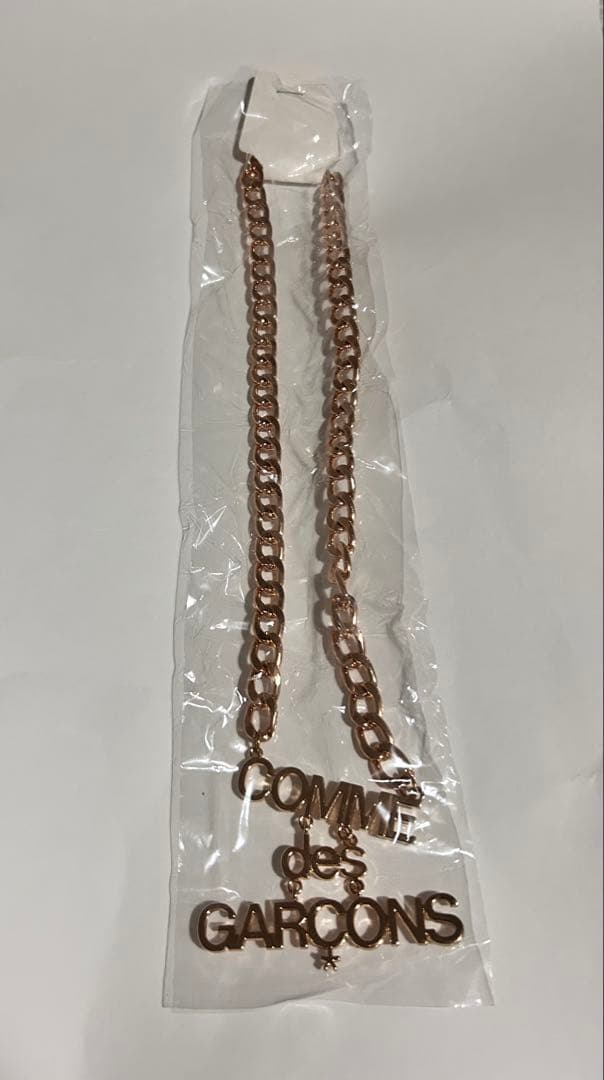 COMME des GARÇONS 新品未使用　ロゴネックレス ゴールド