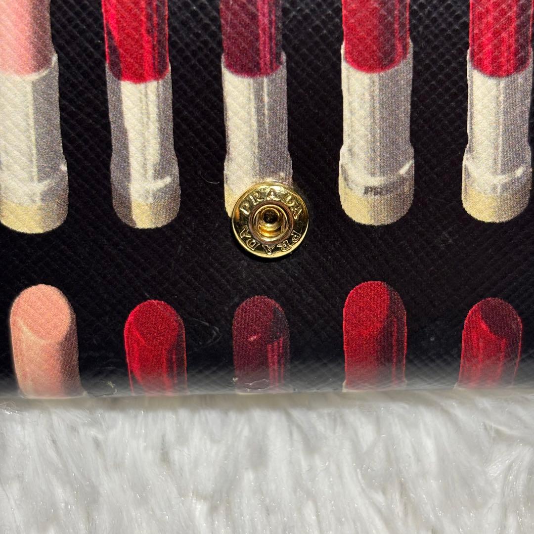 ✨美品✨ プラダ 三つ折り財布 リップ サフィアーノ 三角ロゴ レザー 黒 希少
