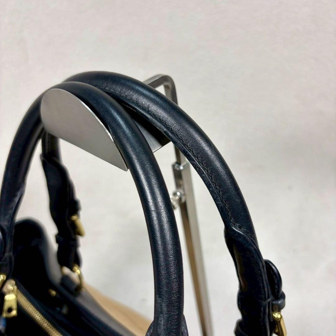 【美品✨】ハンティングワールド　黒 ベージュ　レザー　ヴィンテージ　金具　ロゴ