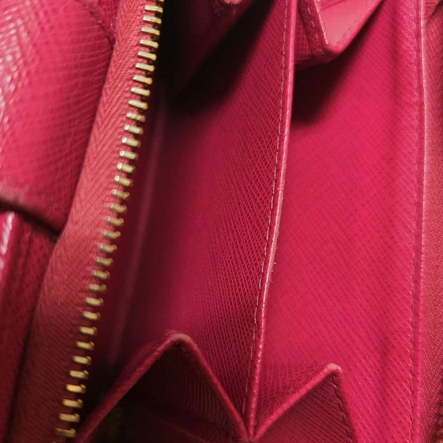s*。様 PRADA ピンク 二つ折り財布