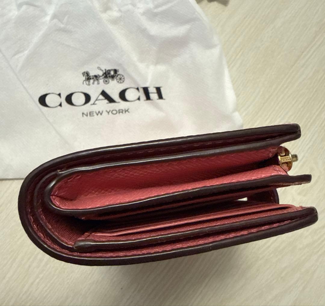 【美品】COACH ピンク 二つ折り財布　保存袋付き　コーチ