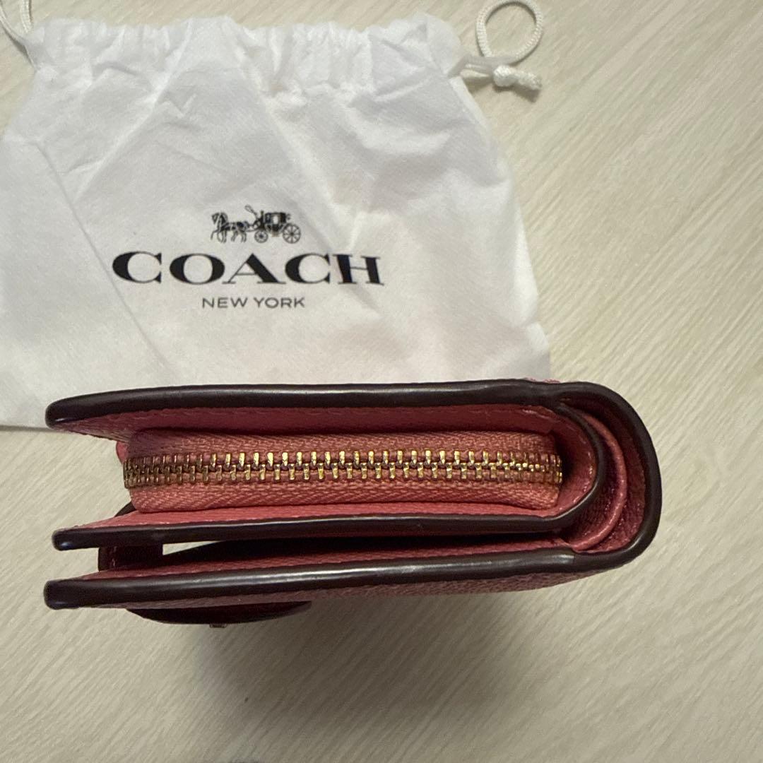 【美品】COACH ピンク 二つ折り財布　保存袋付き　コーチ