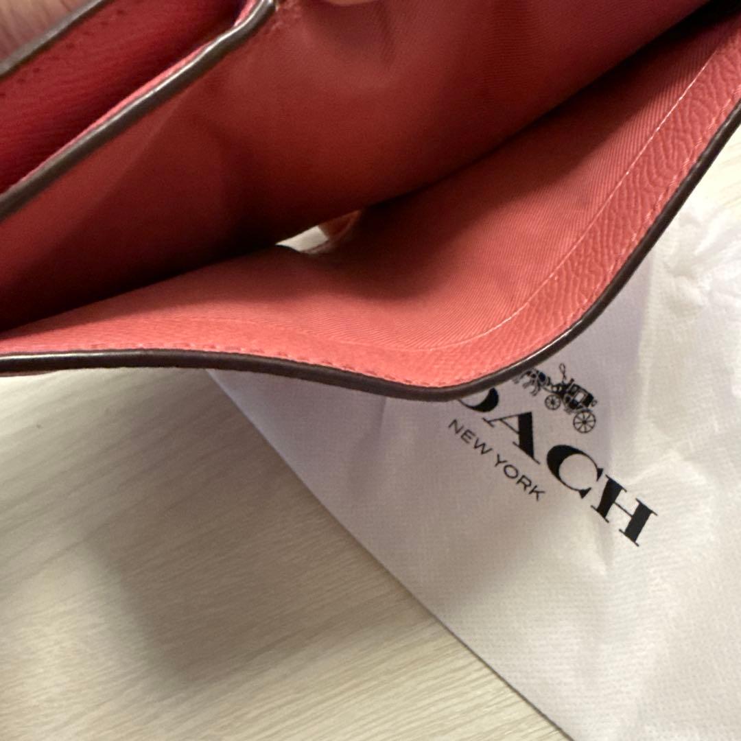 【美品】COACH ピンク 二つ折り財布　保存袋付き　コーチ