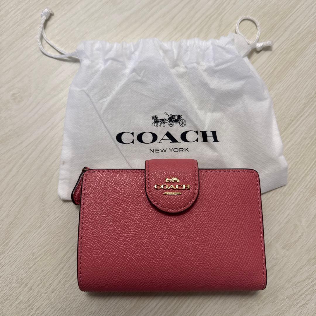 【美品】COACH ピンク 二つ折り財布　保存袋付き　コーチ