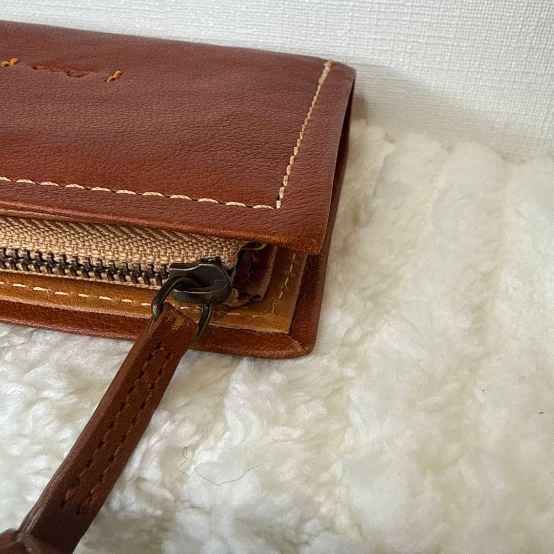 ダコタ 二つ折り財布 ピアッタ ブラウン