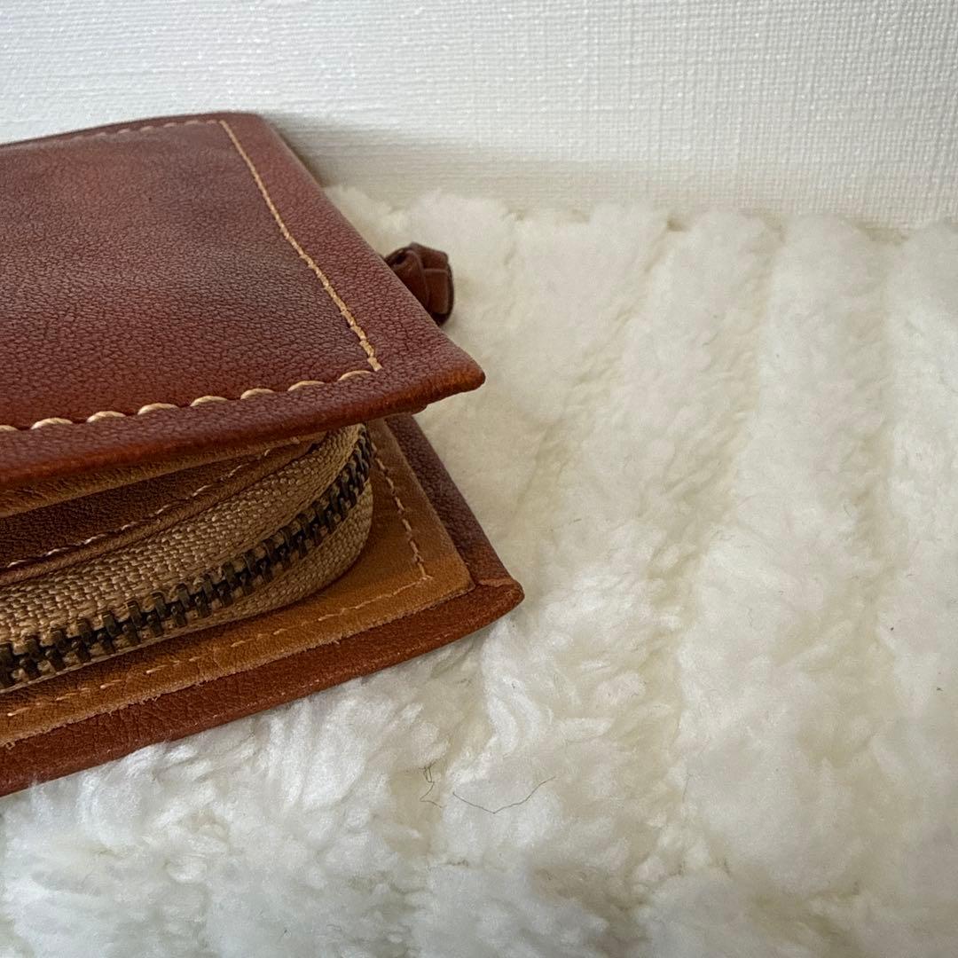 ダコタ 二つ折り財布 ピアッタ ブラウン