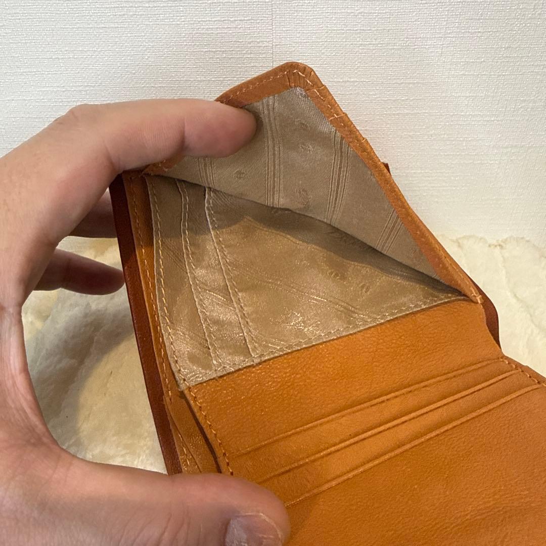 ダコタ 二つ折り財布 ピアッタ ブラウン