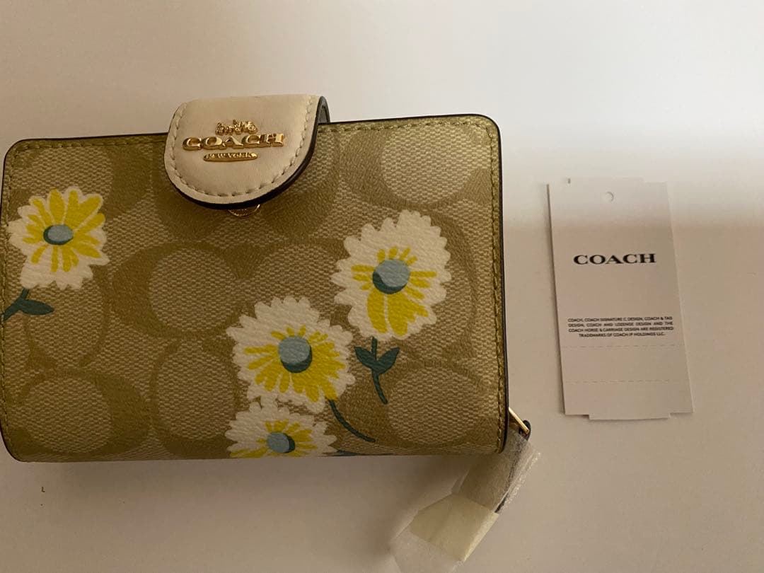 COACH 花柄 二つ折り財布 ベージュ