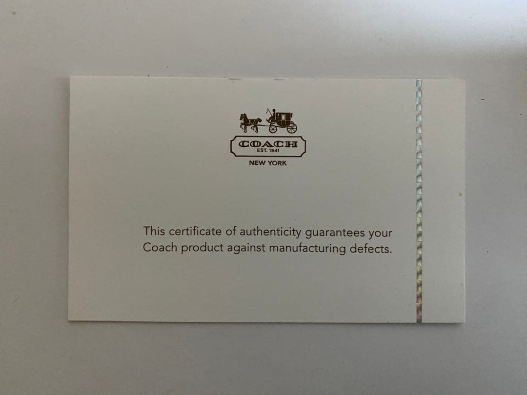 COACH 花柄 二つ折り財布 ベージュ