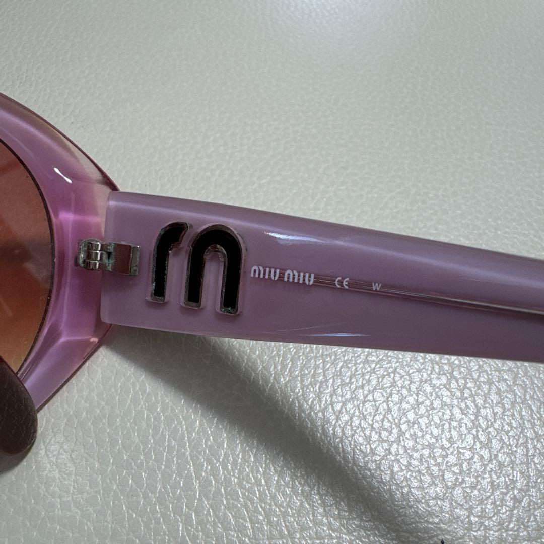 MIU MIU ラウンド型サングラス ピンク グラデーション
