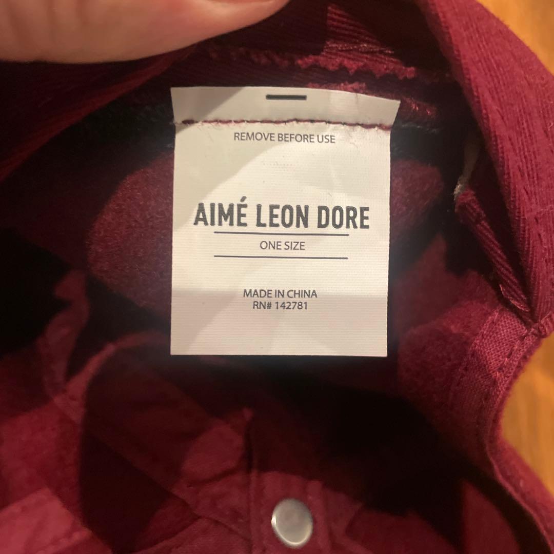 AIMÉ LEON DORE バーガンディキャップ