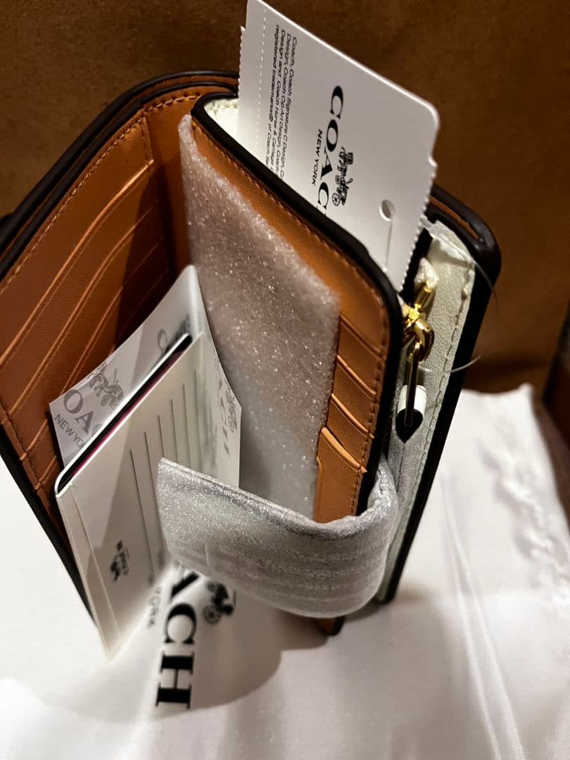 COACH 星柄 ホワイト 二つ折り財布