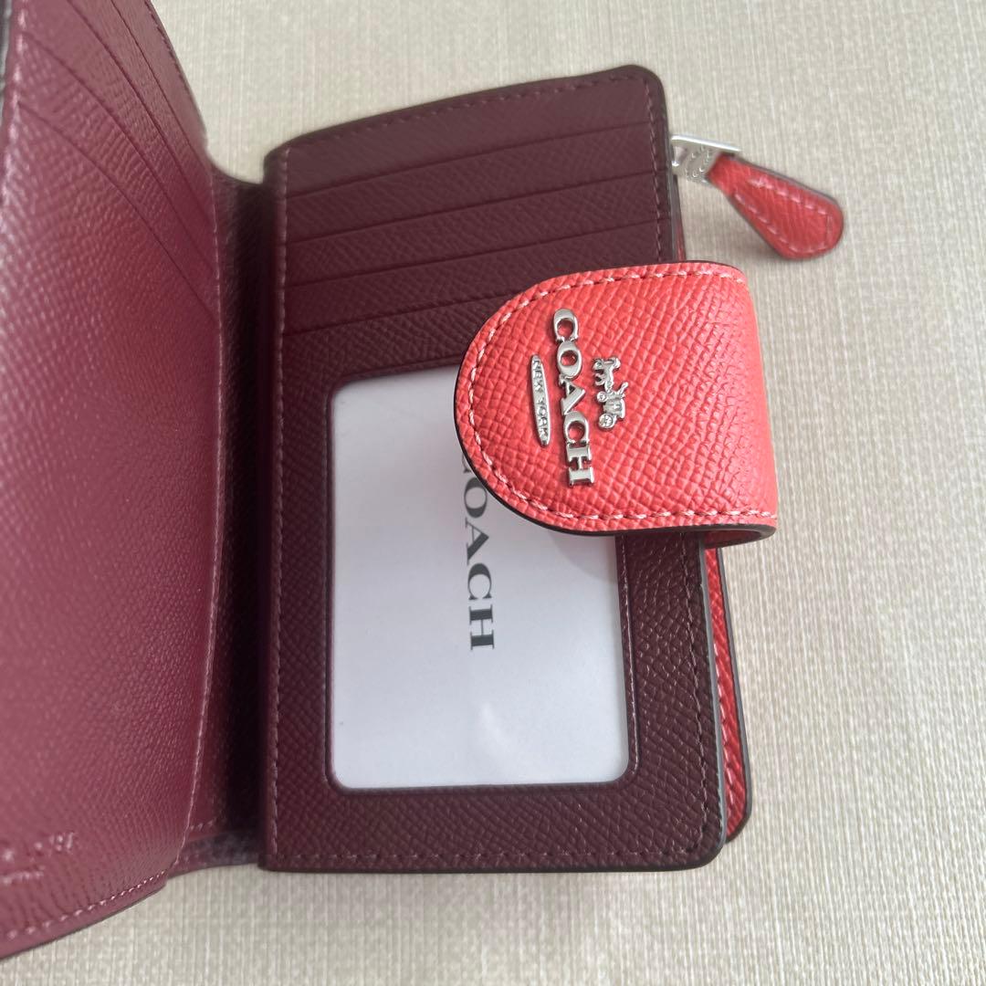 未使用　コーチ　二つ折り財布　オレンジ