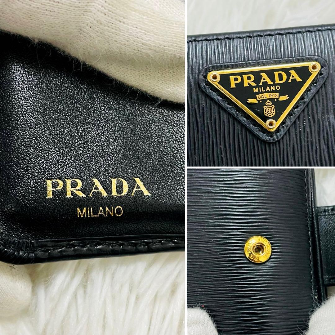 極美✨付属完備✨PRADA 二つ折り財布 トライアングルロゴ レザー 黒