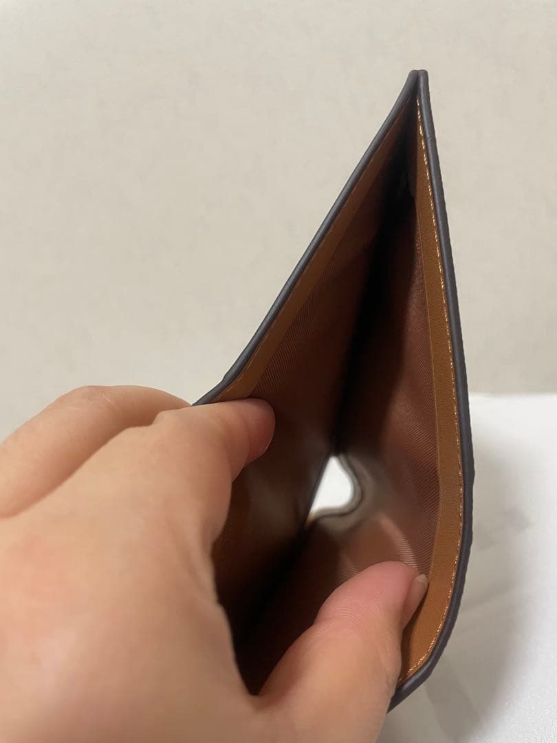 コーチ　レディース　折財布　小銭入れあり　カキー　スヌーピー　新品　未使用