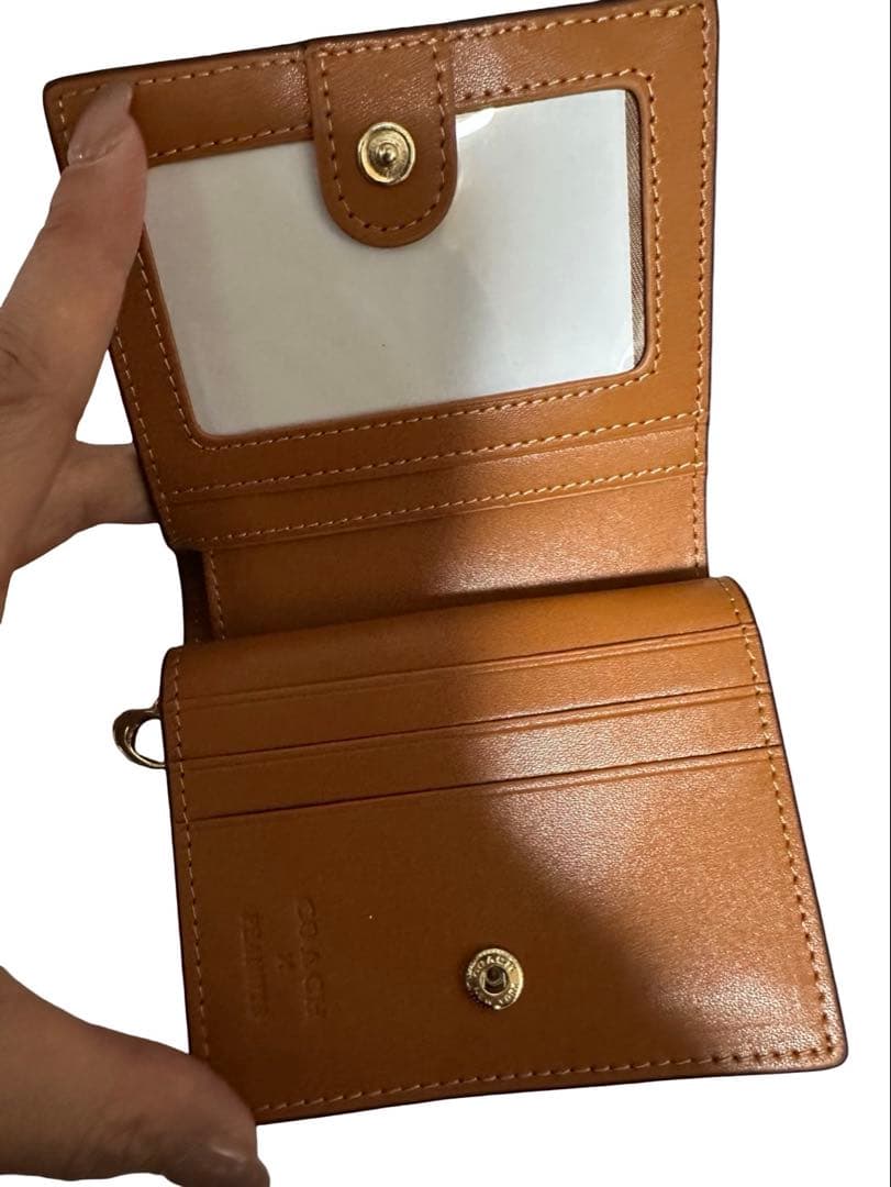 COACHコーチ スヌーピー折り財布 シグネチャー PEANUTS コラボ 美品