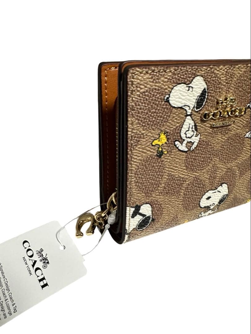 COACHコーチ スヌーピー折り財布 シグネチャー PEANUTS コラボ 美品