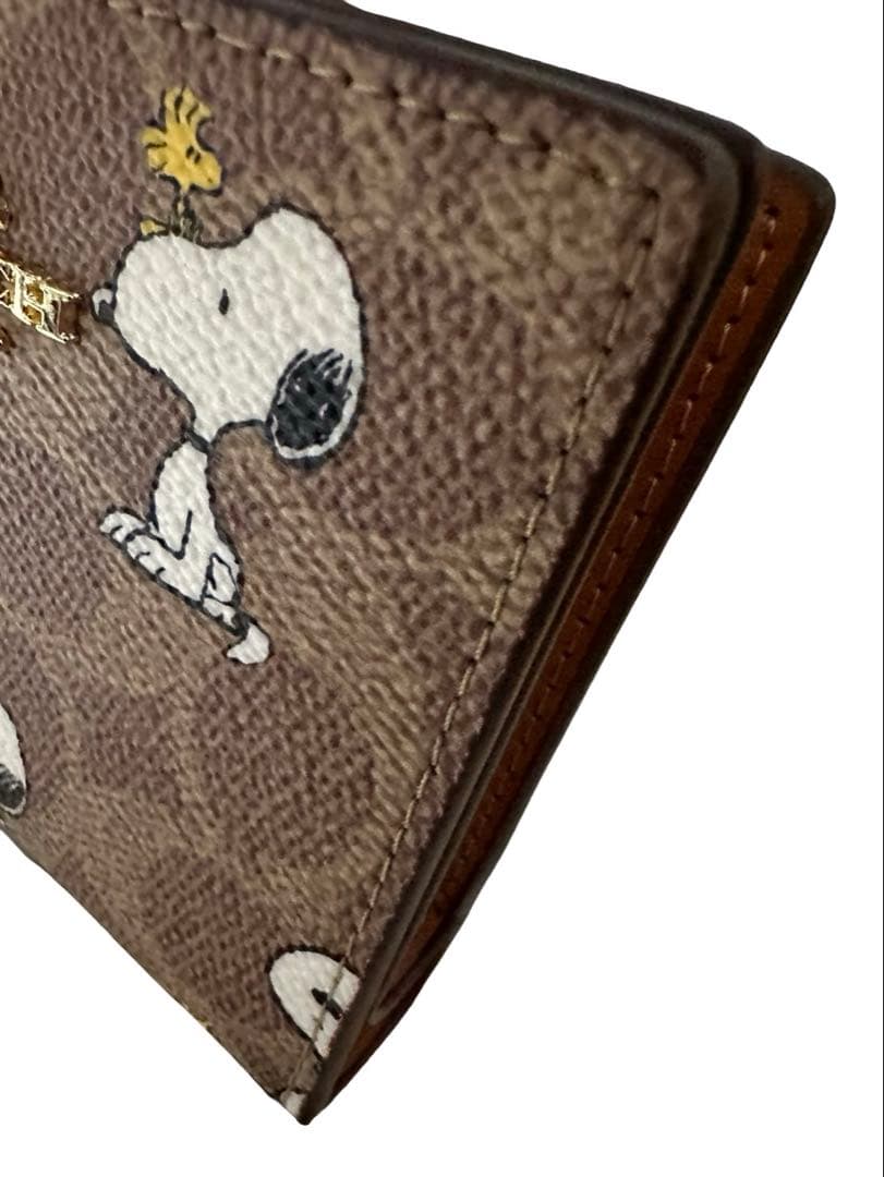 COACHコーチ スヌーピー折り財布 シグネチャー PEANUTS コラボ 美品