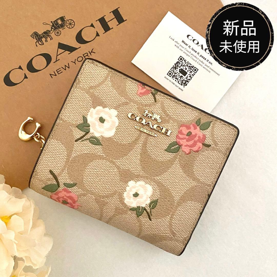 新品　正規品☆COACH コーチ　折り財布　 花柄　シグネチャー 二つ折り財布