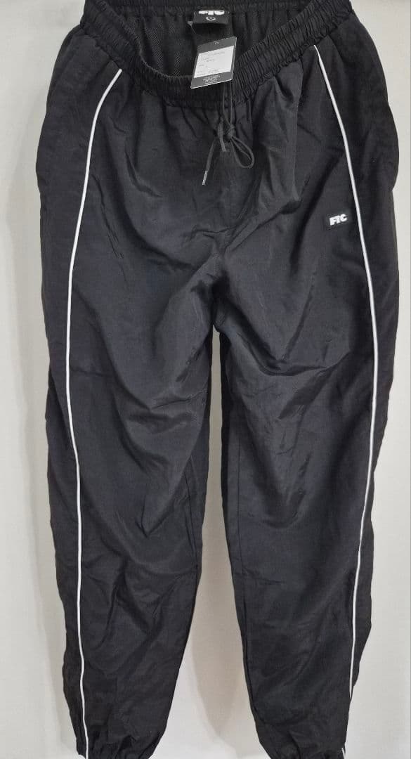 パンツ FTC PIPING NYLON TRACK PANT BLACK S