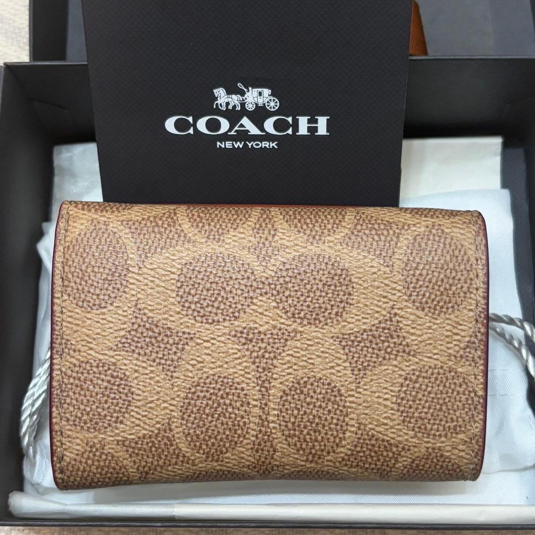 耀*ん様 【新品】COACH ミニ キャンバス トライフォールド ウォレット
