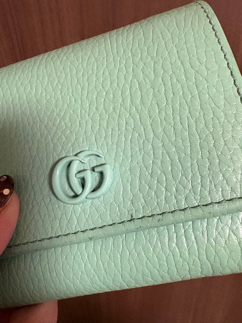 GUCCI ミニ財布 マーモント エンボスロゴGG