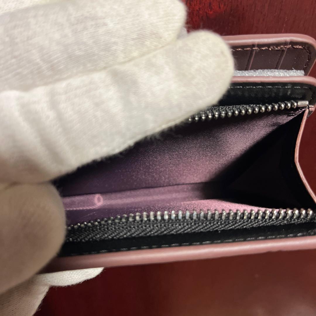 ✨️新品未使用✨️COACH エンボス加工 ブラック 二つ折り財布