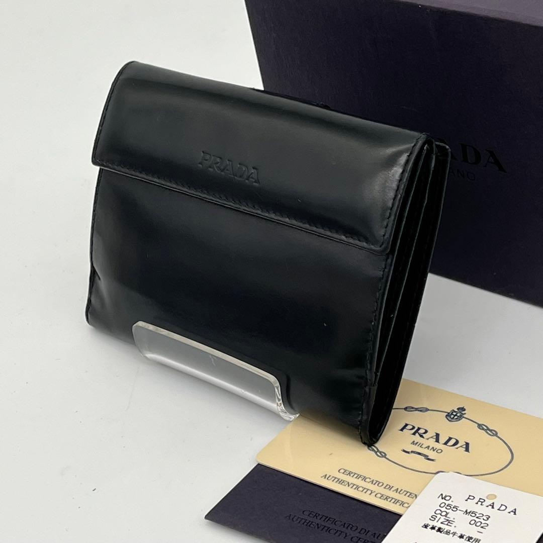 PRADA 二つ折り財布 ロゴ型押し ブラック エナメル 付属品付き 男女可能