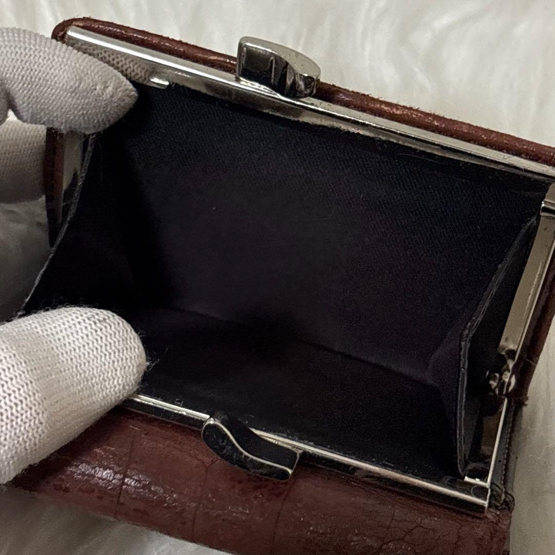 【美品】ヴィヴィアンウエストウッド レザー 二つ折り財布 オーブ がま口 ロゴ