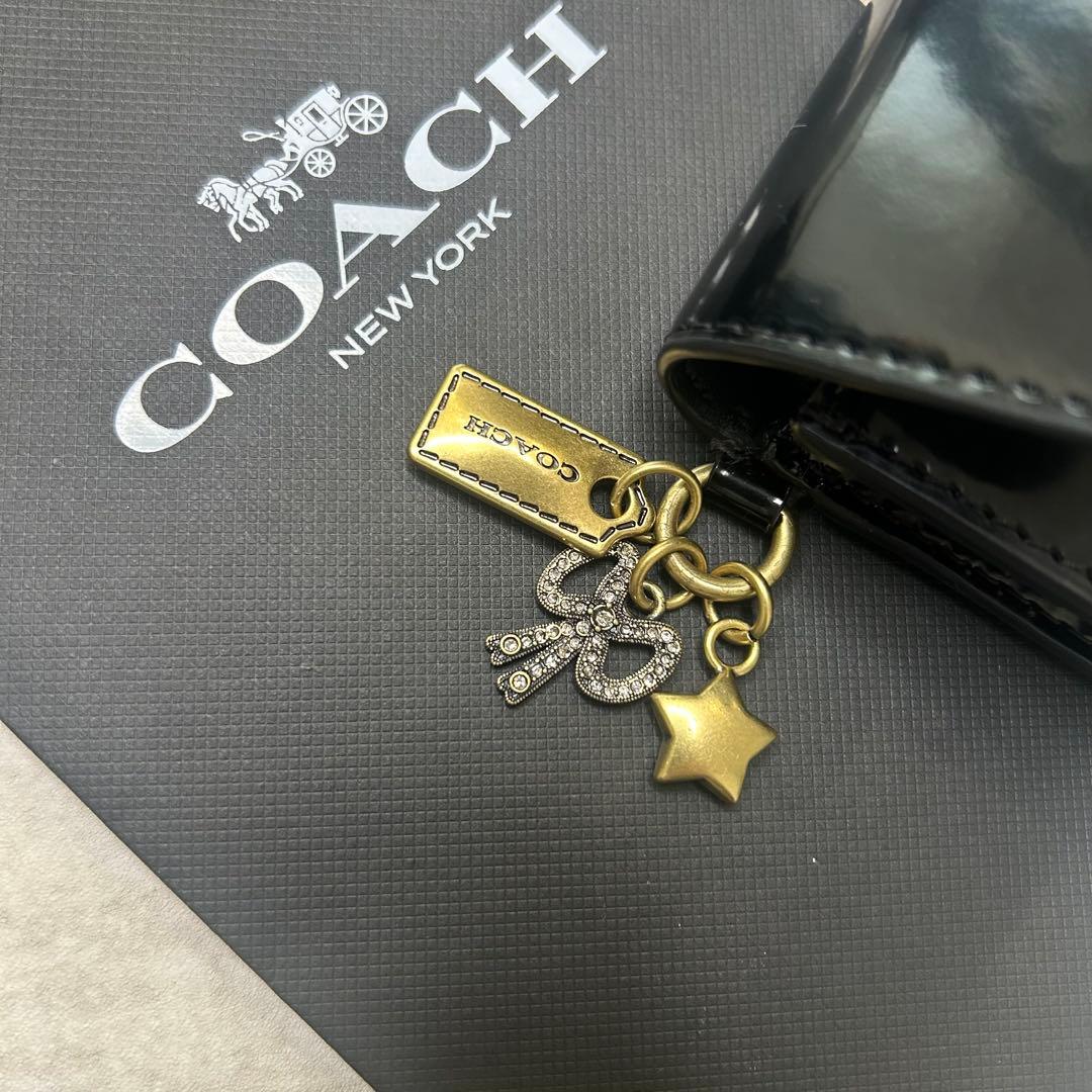 COACH フラップ 二つ折り財布 タビー カードケース チャーム付