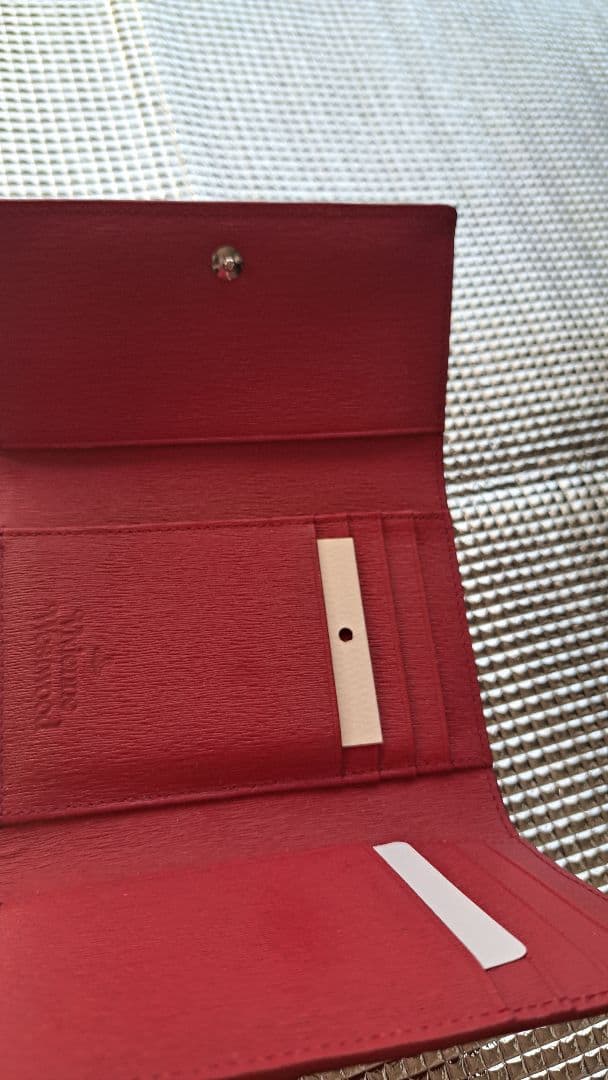 レッド 三つ折り財布 ロゴ付き