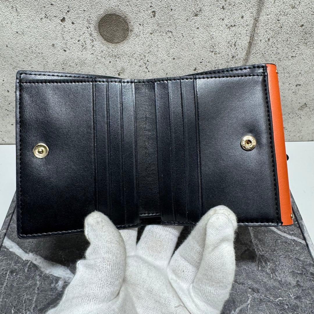 と*も様 【美品】COACHコーチ 二つ折り財布 シグネチャー柄キャンバス柄