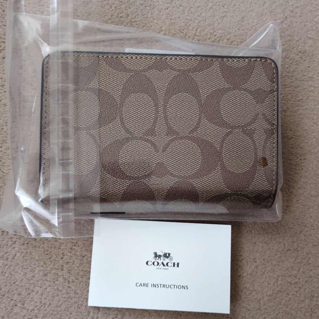 新品 未使用、COACH 二つ折り財布