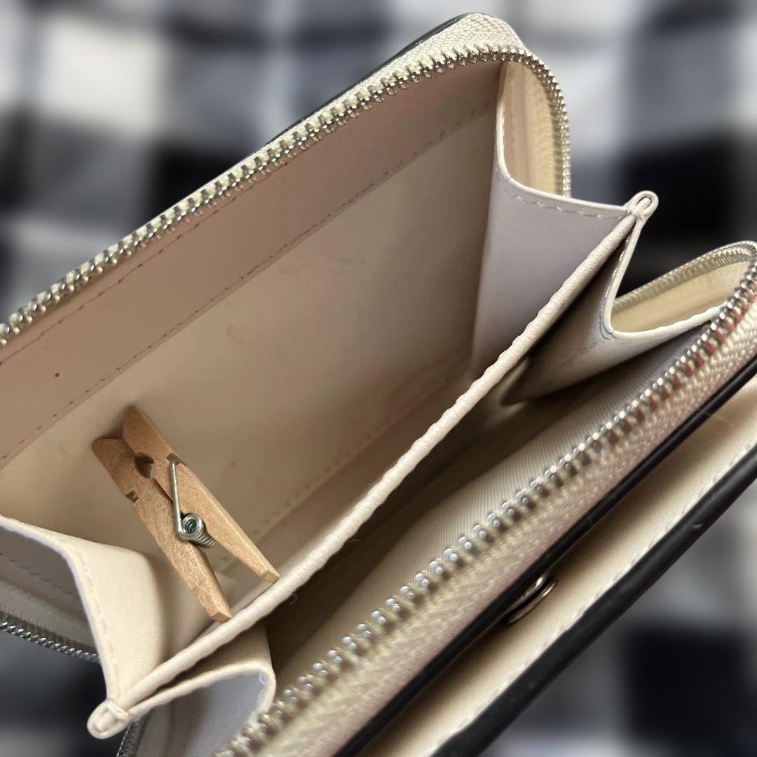 COACH イチゴ柄 二つ折り財布