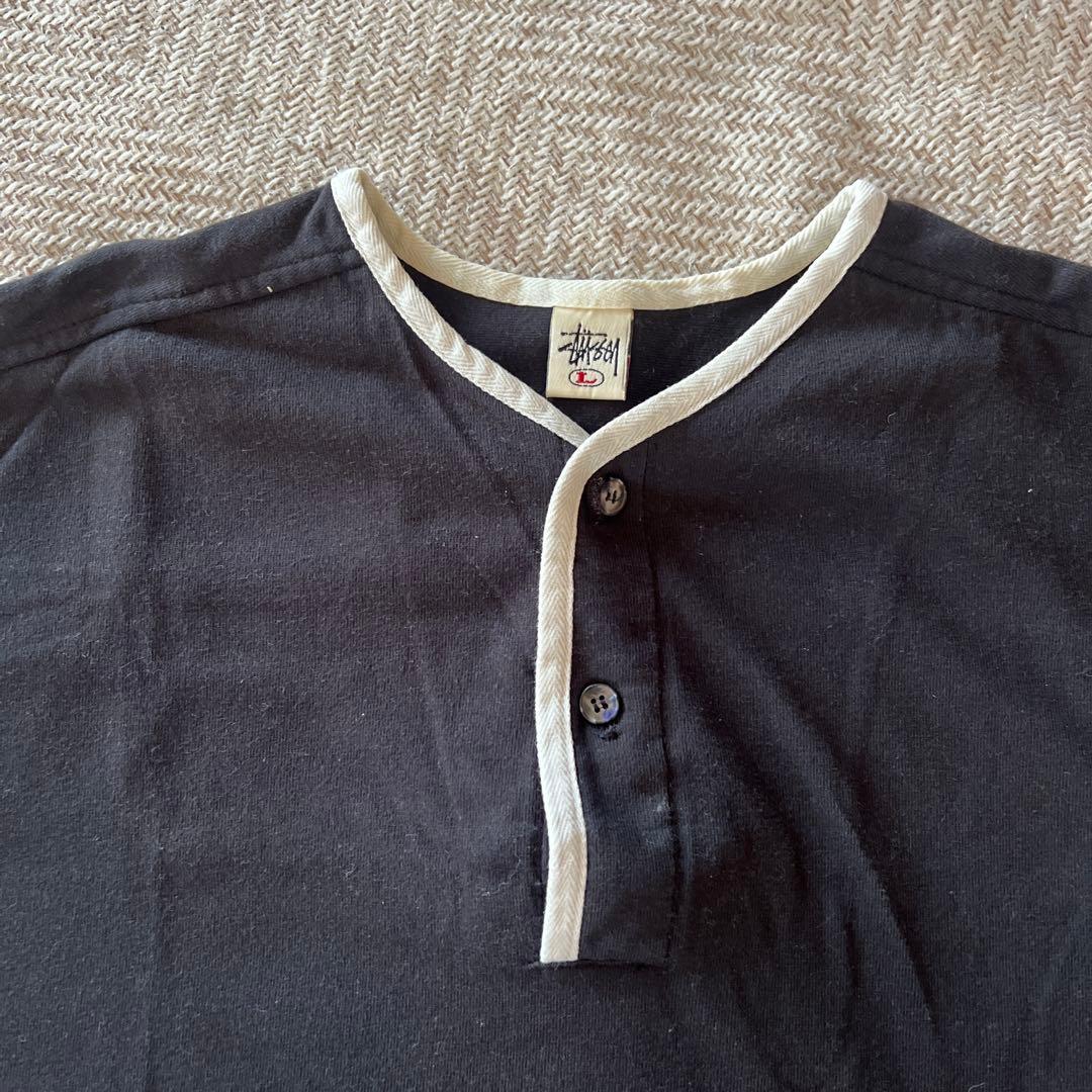 OLD StussyヘンリーネックのブラックTシャツ