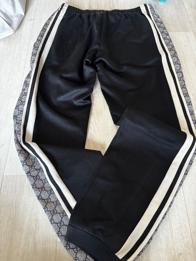 美品　GUCCIコットンブランドジャージートラックパンツ黒GG柄