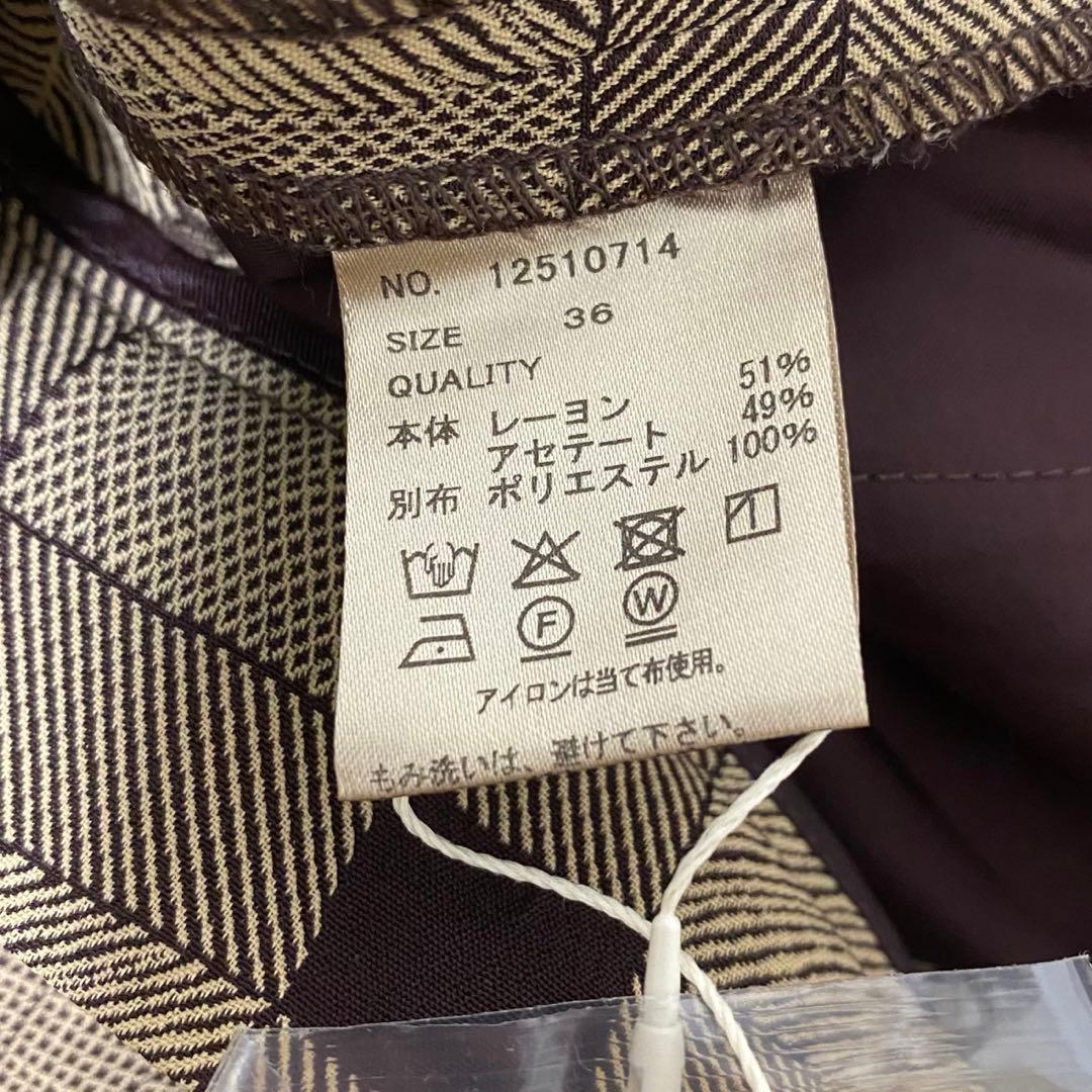 トップス toomi