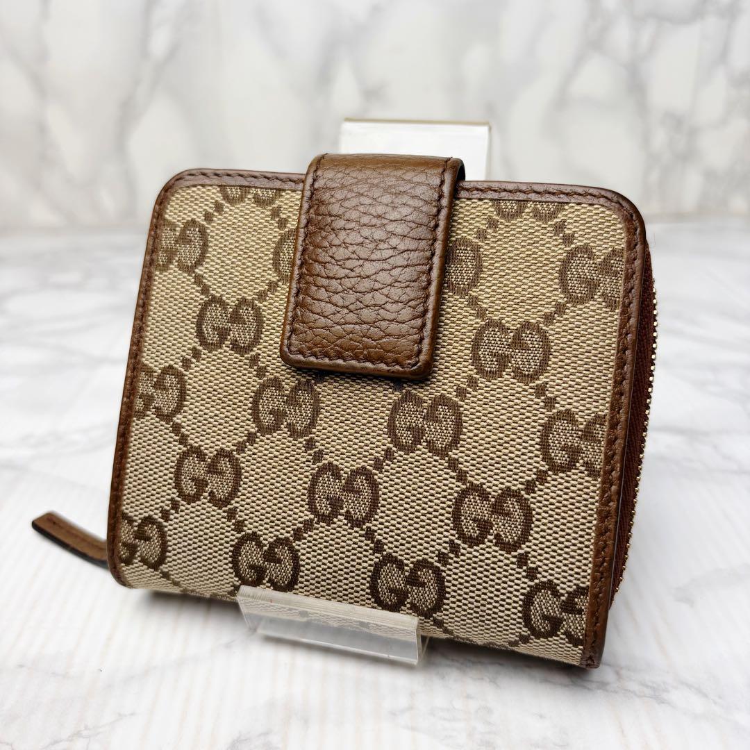 011 極美品 GUCCI 二つ折り財布 ラウンドファスナー GG柄 茶 m6