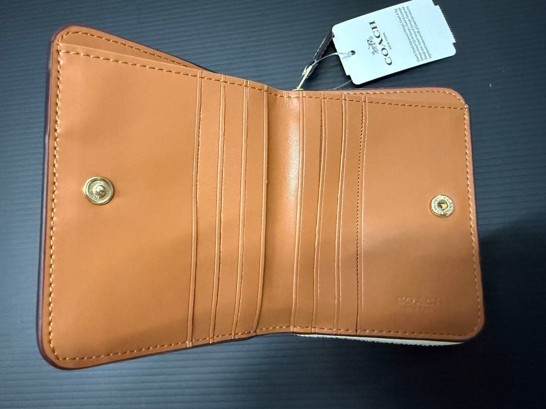 coach 花柄 二つ折り財布