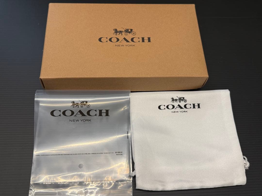 coach 花柄 二つ折り財布