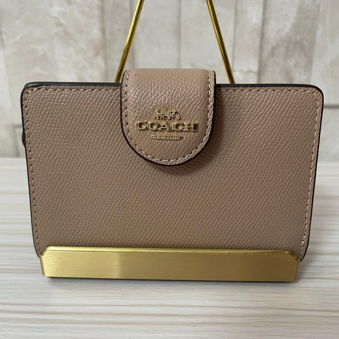 早い者勝ち！訳あり新品 COACH 二つ折り財布 ベージュ系