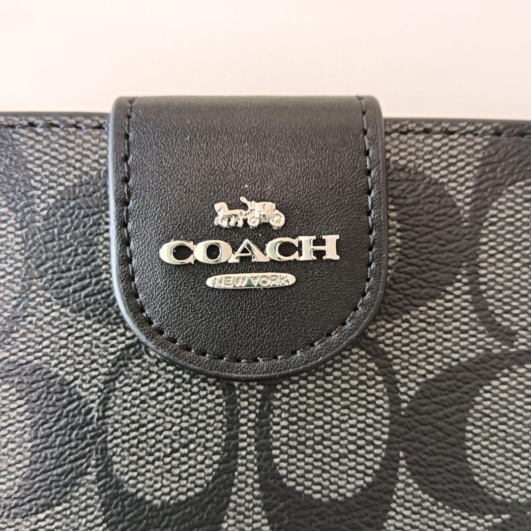 新品　COACH 長財布　コーチ　二つ折り財布 ブラック シグネチャー シルバー