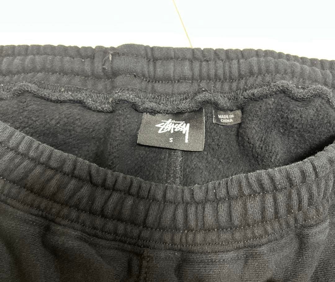 Stussy ブラック スウェットパンツ