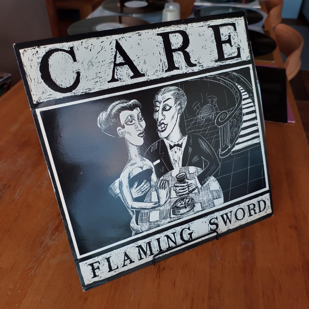 洋楽 UK 1st issue \"Flaming Sword/CARE\"