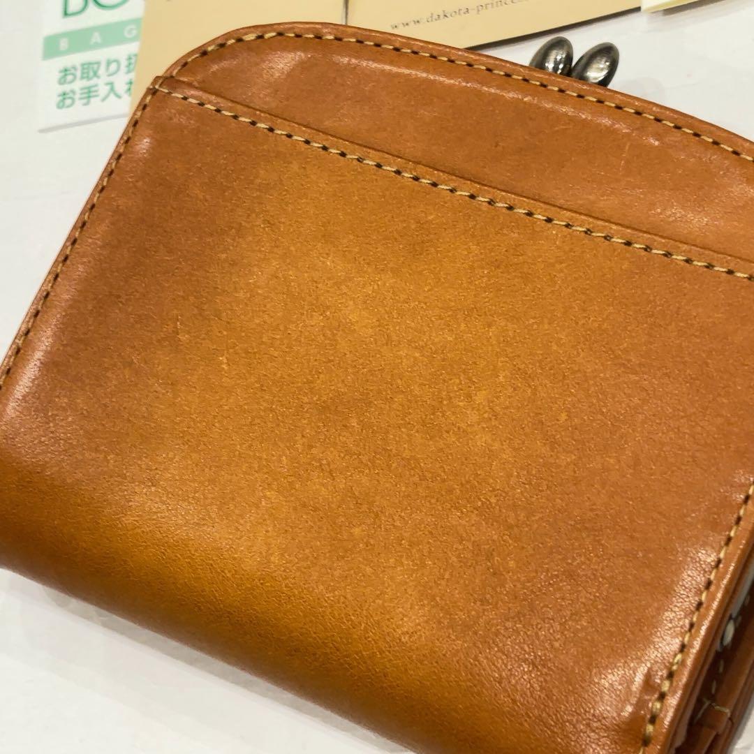 新品　ダコタ　マーゴット　二つ折り　財布　 ラウンドファスナー　レザー　がま口