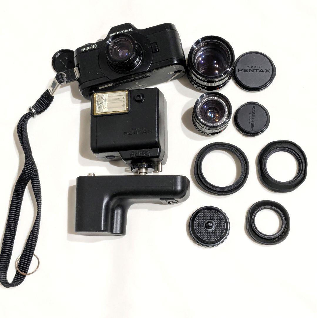 d*2様 PENTAX auto110 動作確認済 レンズ複数付 電池室金具外れ