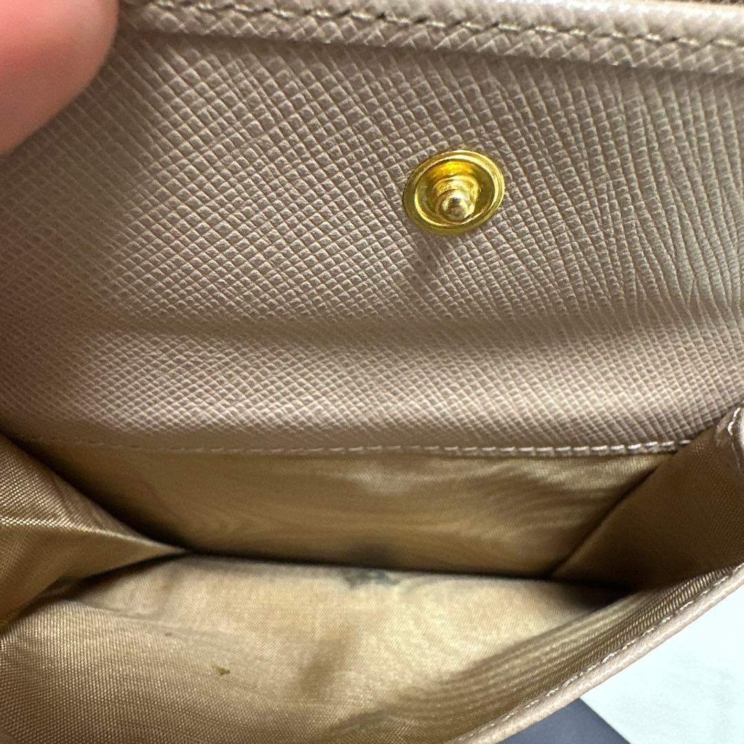 a.　PRADA サフィアーノレザー 二つ折り財布 1ML018