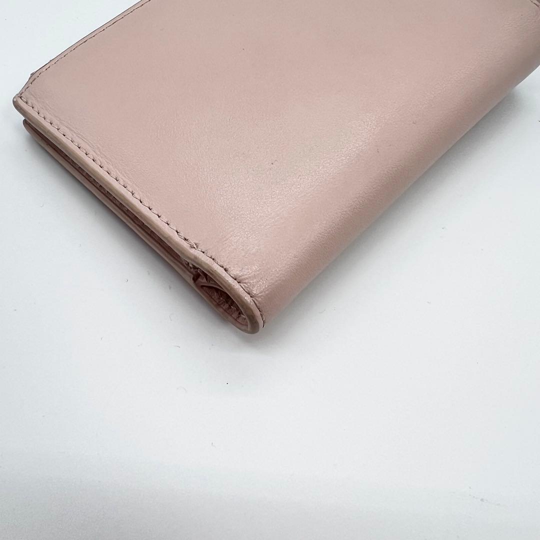 美品✨ディーゼル　ミニウォレット　二つ折り財布　Dロゴ　メタルロゴ　ピンク